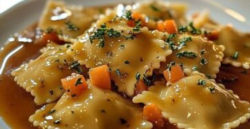 Brown butter herb ravioli with diced carrots