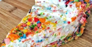 Fruity pebble rice krispy treat cheese cake