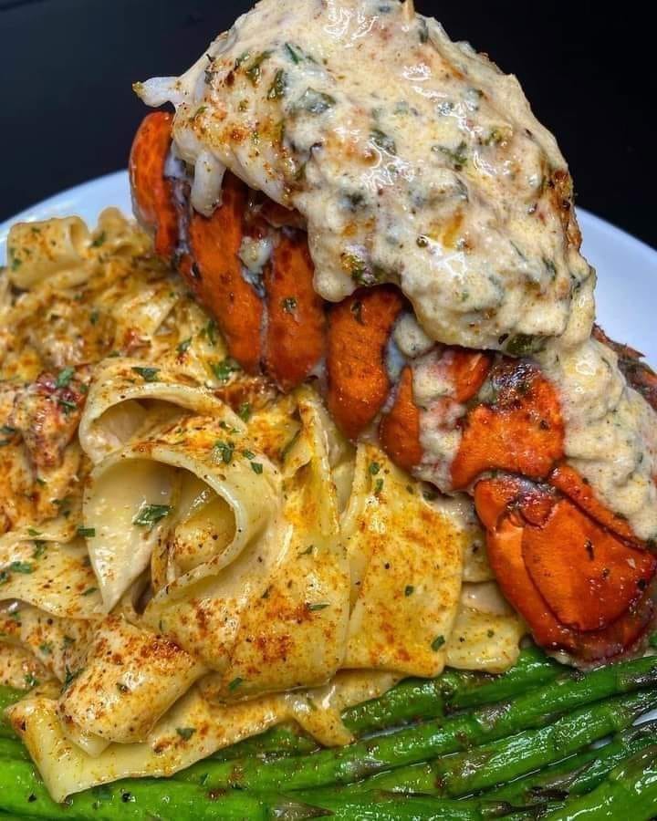 Cajun lobster , crab and salmon alfredo