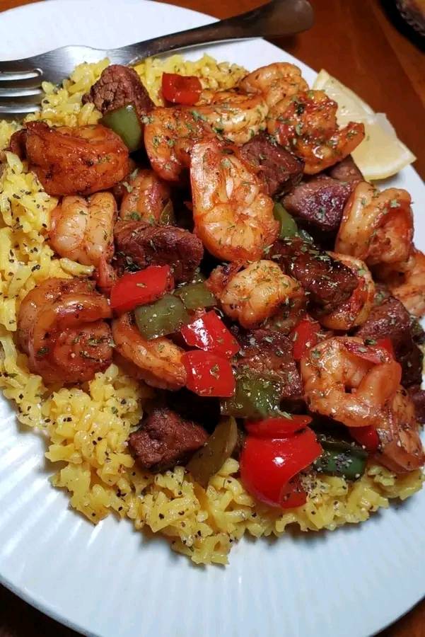 Jerk steak & shrimp over yellow ricewow