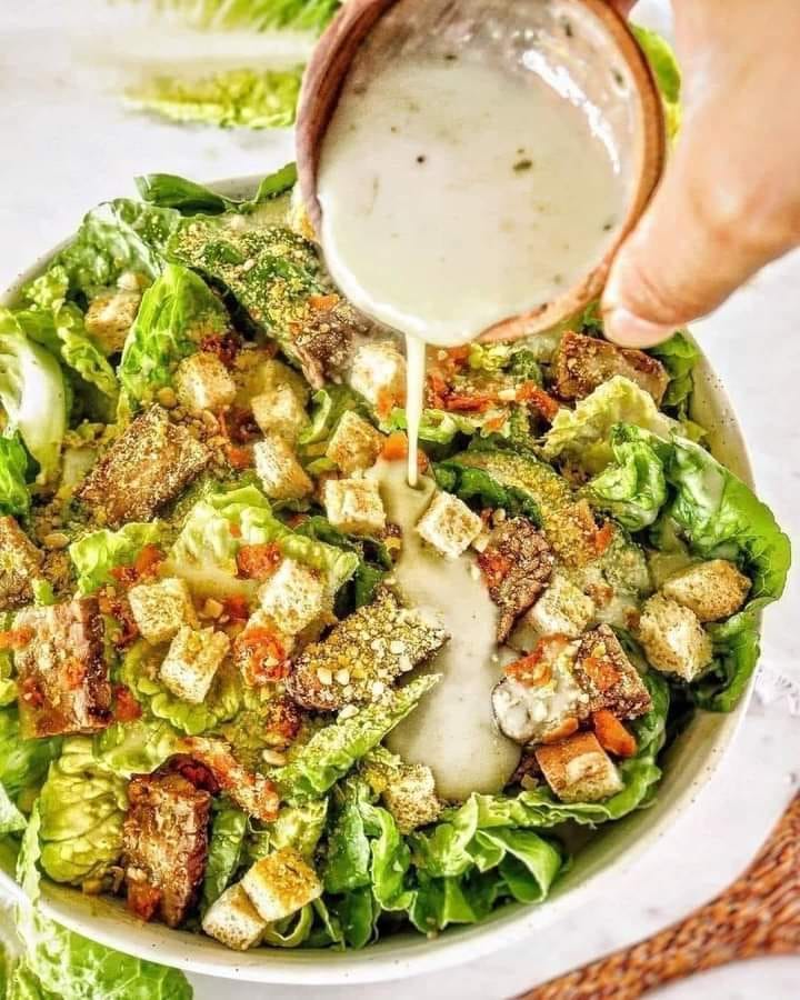 Vegan caesar salad with tempeh bacon