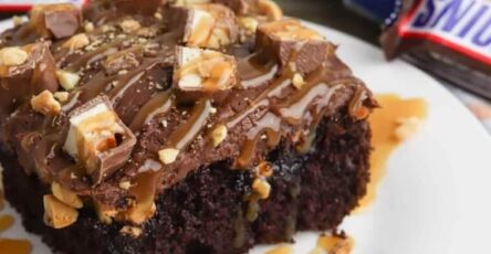 Easy snickers poke cake