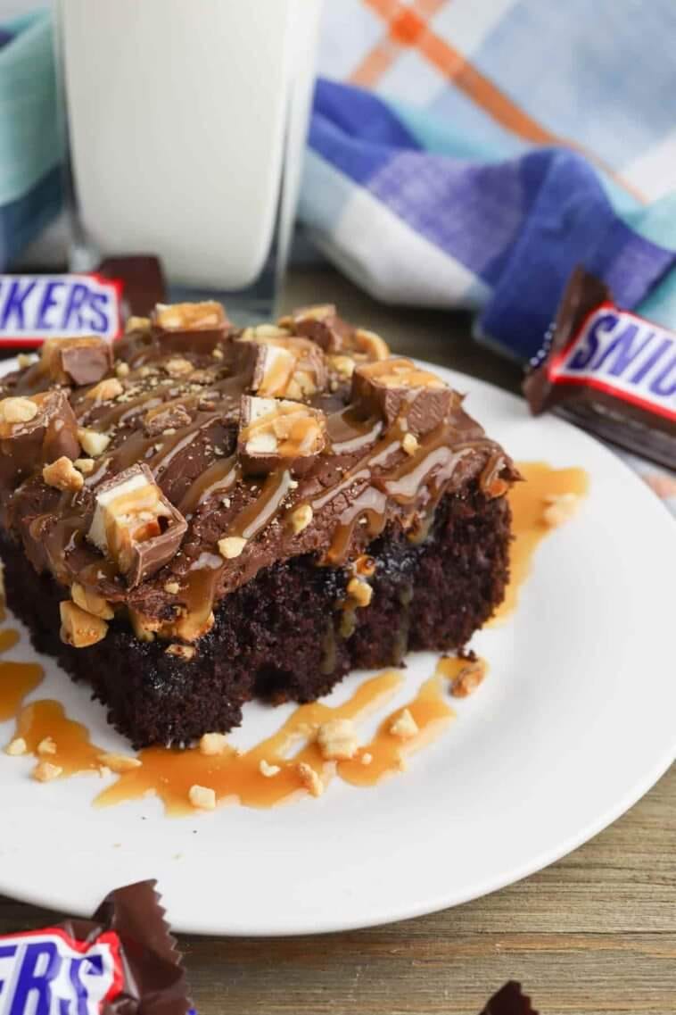 Easy snickers poke cake