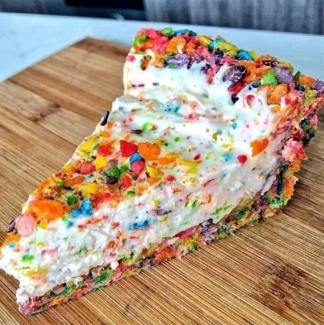 Fruity pebble rice krispy treat cheese cake