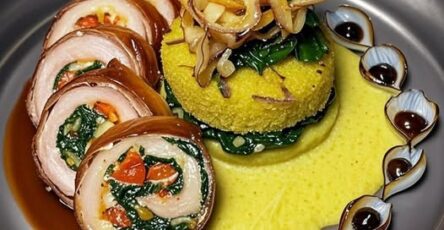 Colorful, flavorful, and full of life—this chicken roulade is packed with veggies and set against a sunny polenta mountain