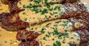Juicy steak with creamy garlic sauce