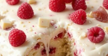 White chocolate raspberry poke cake