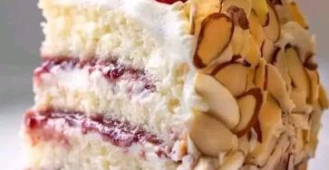 This Almond Raspberry Cake With White Chocolate Amaretto Buttercream Frosting