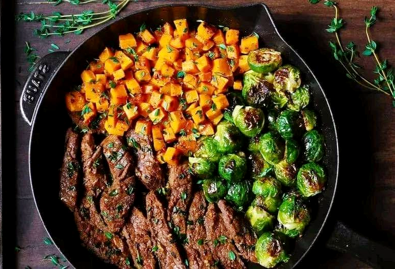 Garlic butter steak with brussels sprouts and butternut squash